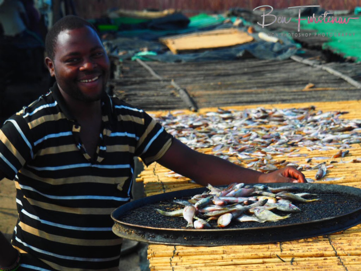 Happy fisherman on dry station in Chembe, Cape Maclear, Lake Malawi, Malawi 